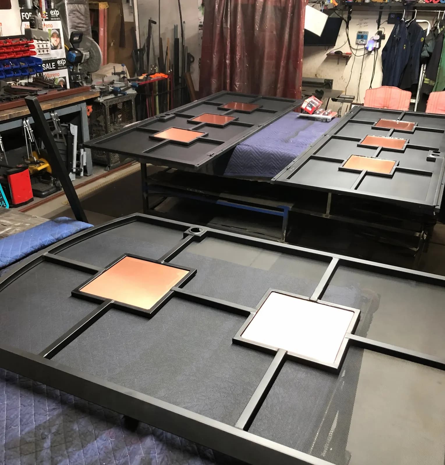 Security door and matching gate with copper panels being built in the shop
