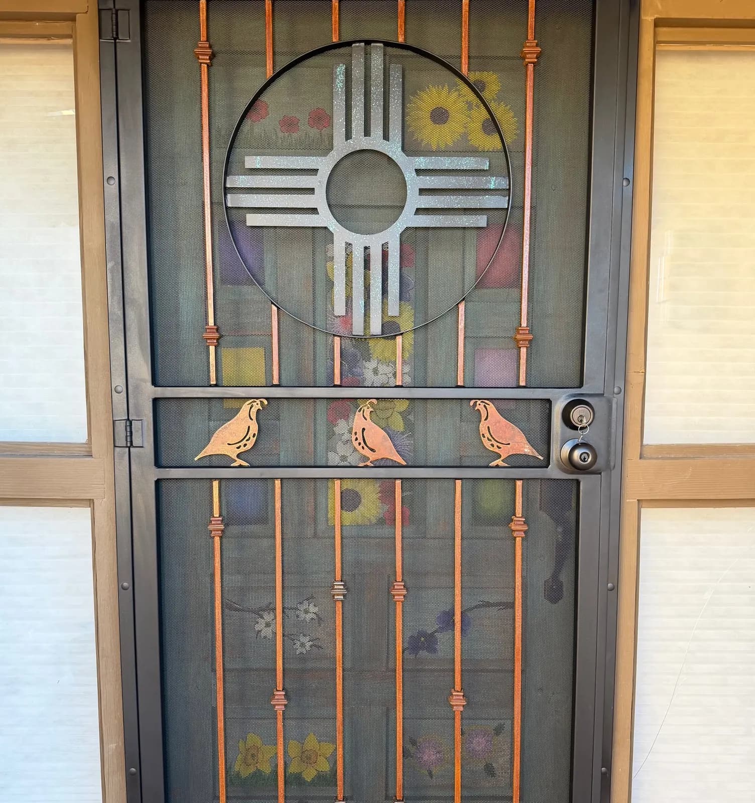 Installed custom Zia security door with quail and sunflower screen, Las Cruces