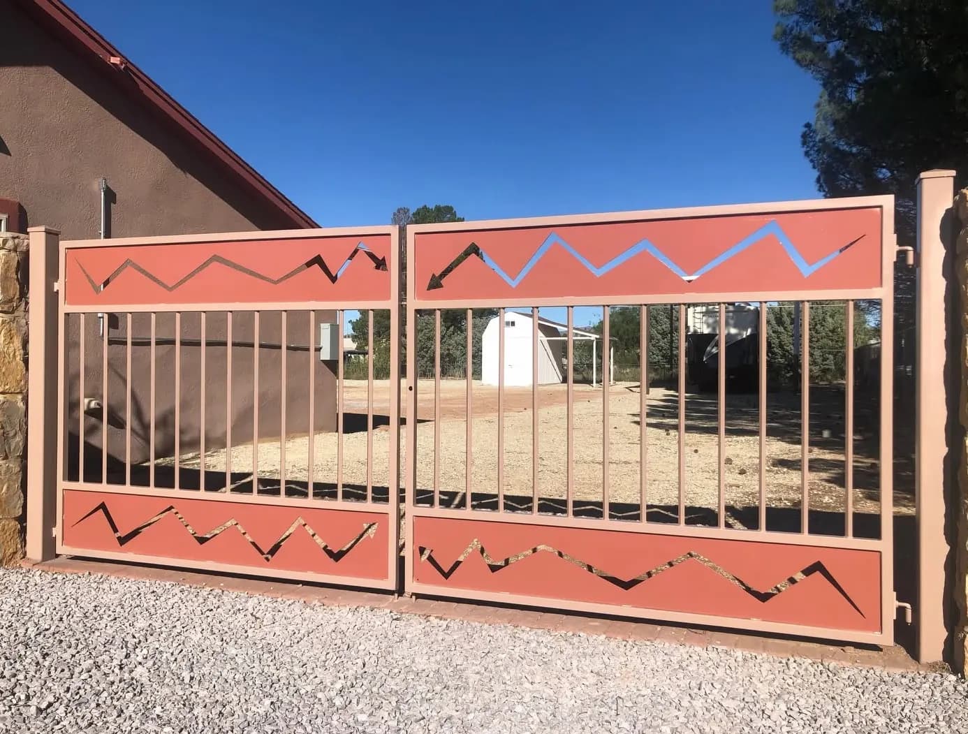 Southwest steel driveway gate with a mountain-range cutout, Las Cruces
